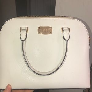 Micheal kores white hand bag